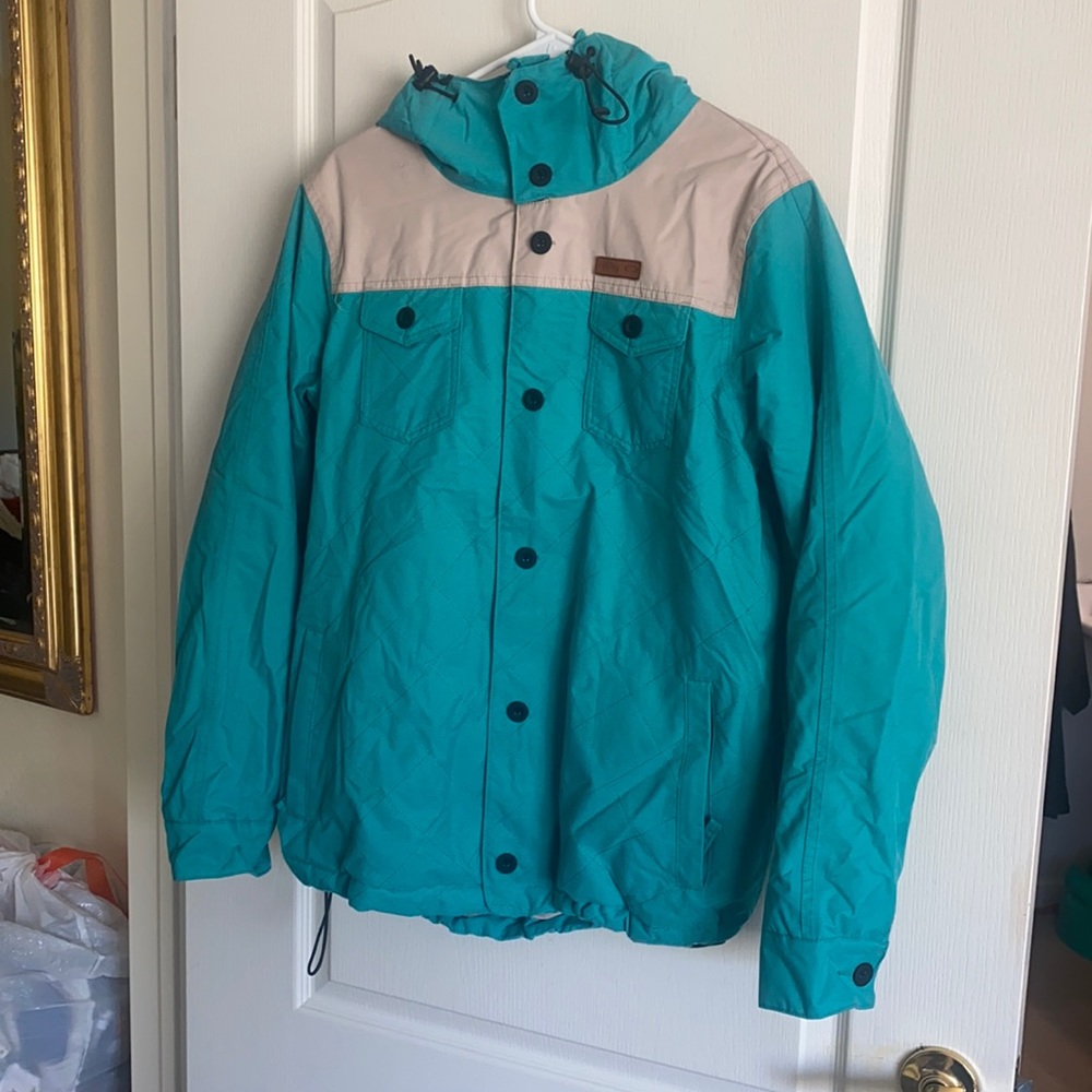 Blue and beige Oakley ski jacket